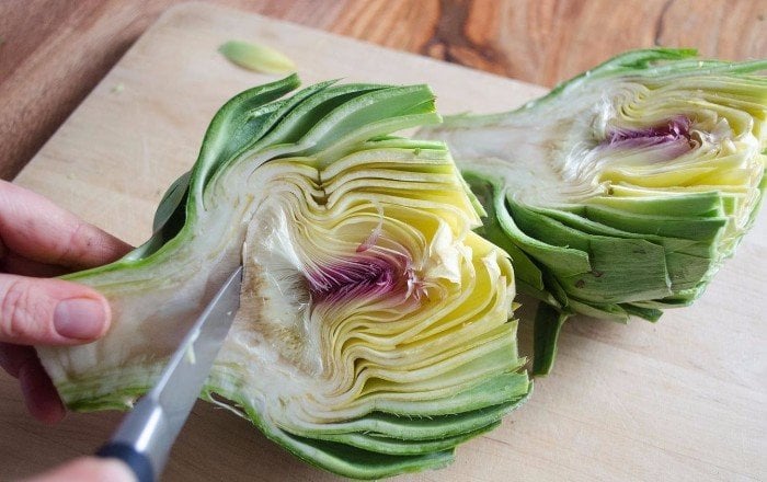 Cutting the artichokes