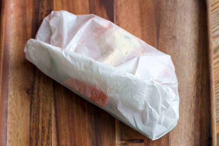 Vegetables folded in paper bag