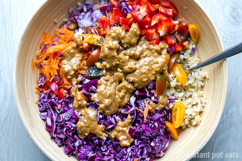 Asian peanut butter dressing in a brown rice salad