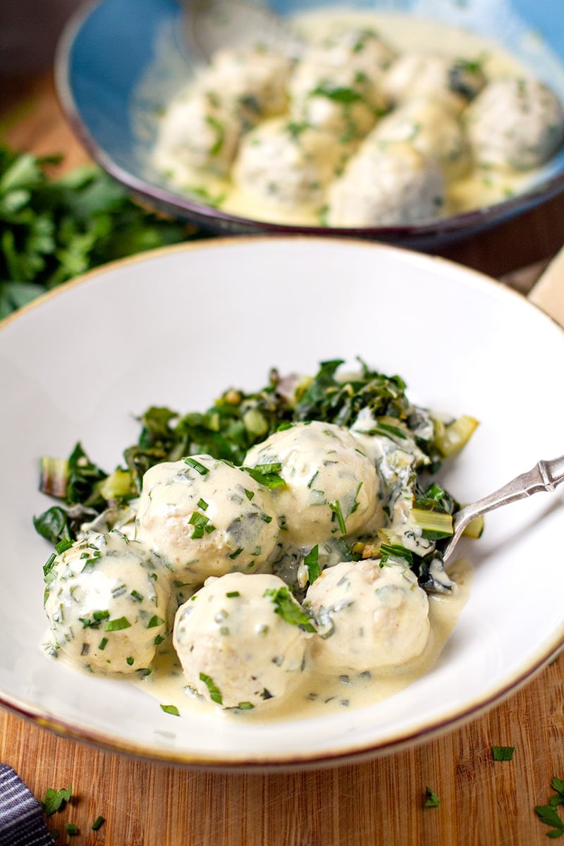 Pressure cooker chicken meatballs with Alfredo sauce and sautéed greens