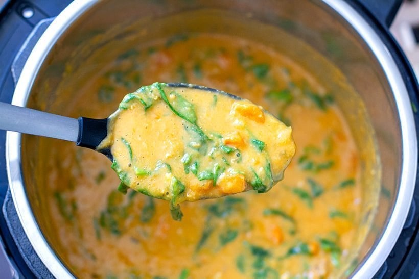 Pressure cooker red lentil soup with spinach and coconut milk