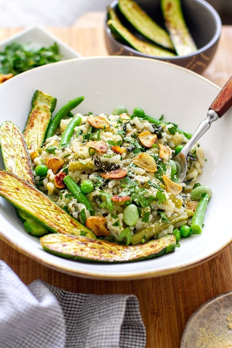 Instant Pot vegan risotto with green vegetables, zucchini and fried garlic