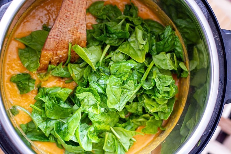 Red curry lentil soup with spinach