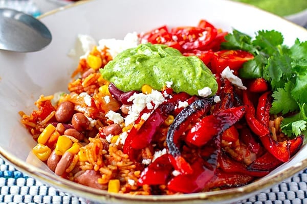 VEGETARIAN INSTANT POT BURRITO BOWL WITH AVOCADO CREMA