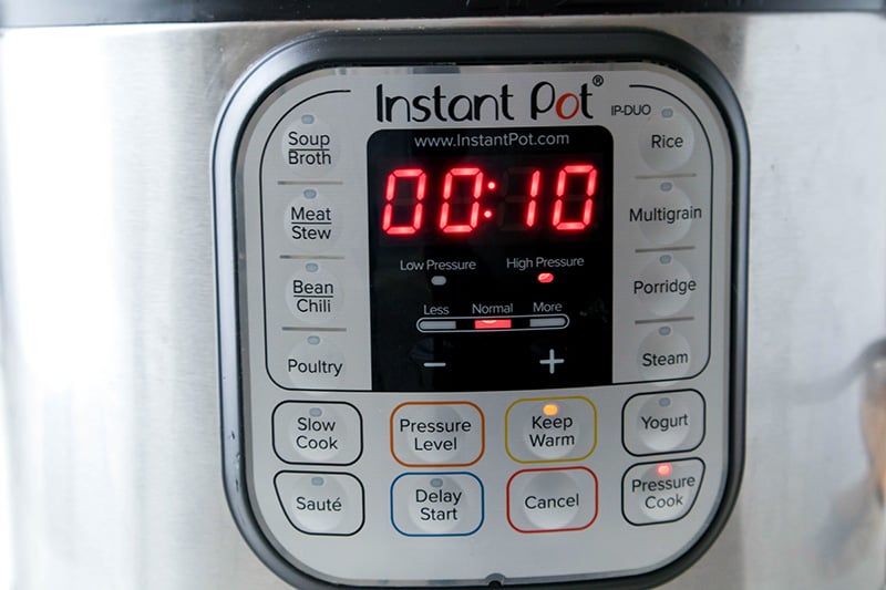 Making Mississippi chicken in Instant Pot step 4: pressure cook for 10 minutes on high.