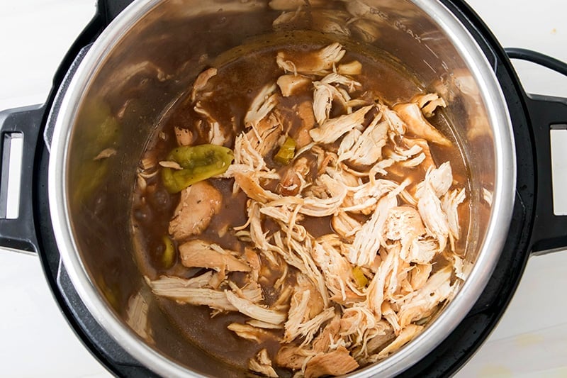 Step 8. Add shredded chicken back to the Mississippi gravy.