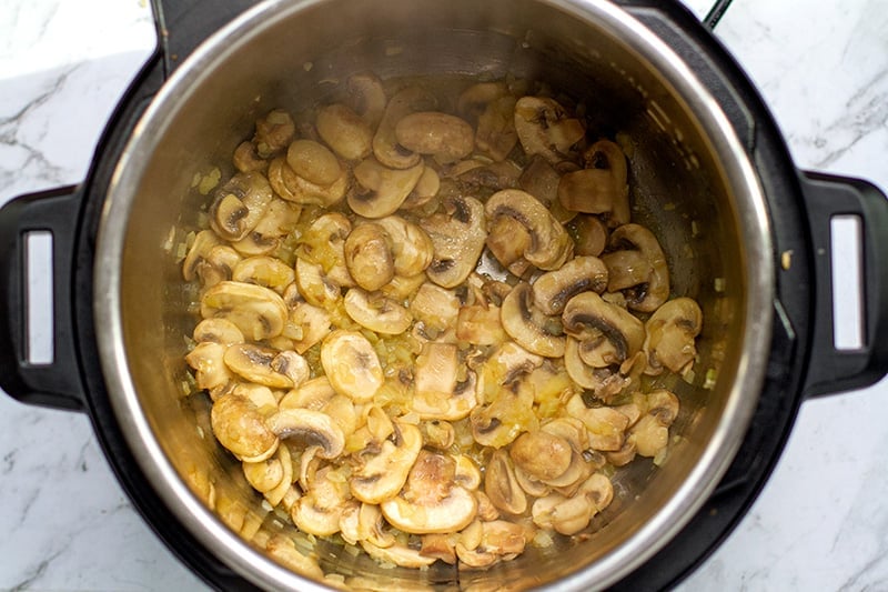 Cook mushrooms and onions in the Instant Pot