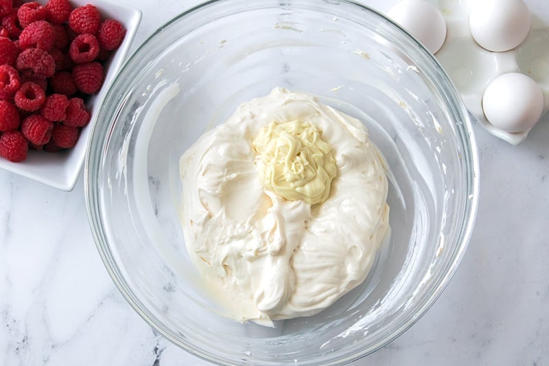 Add melted white chocolate to the cream cheese filling