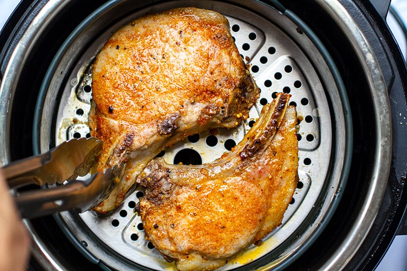Turn the pork chops over in the air fryer