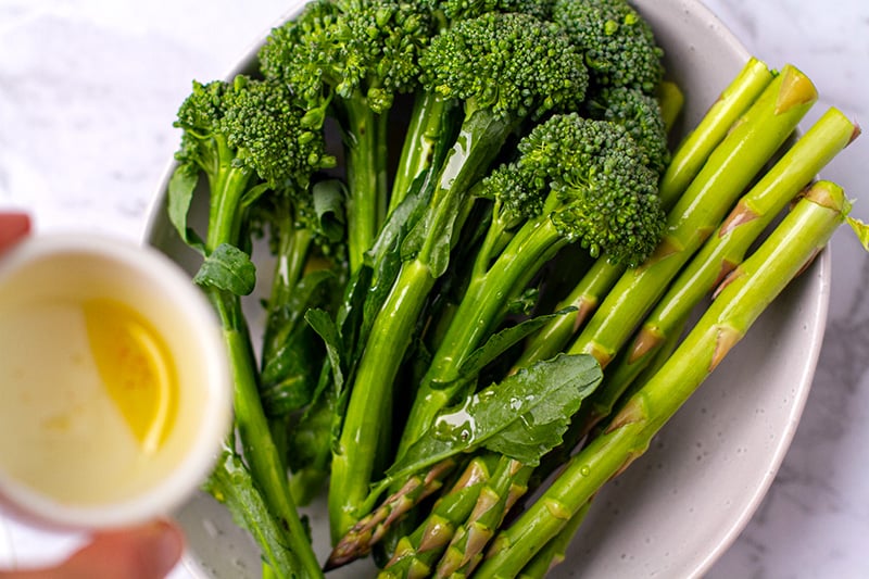 Sizzling green vegetables with olive oil