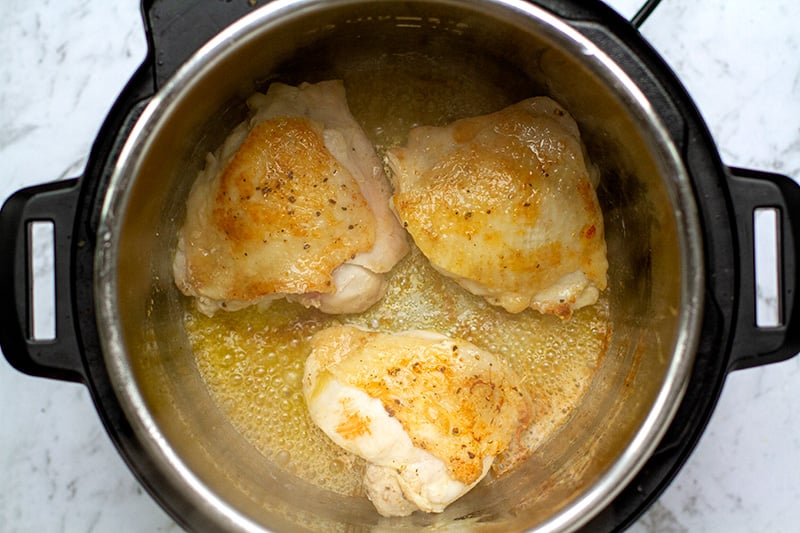 Browning the chicken on the meat side for Fricassee recipe