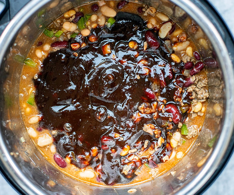 Step 7 adding barbecue sauce to beans