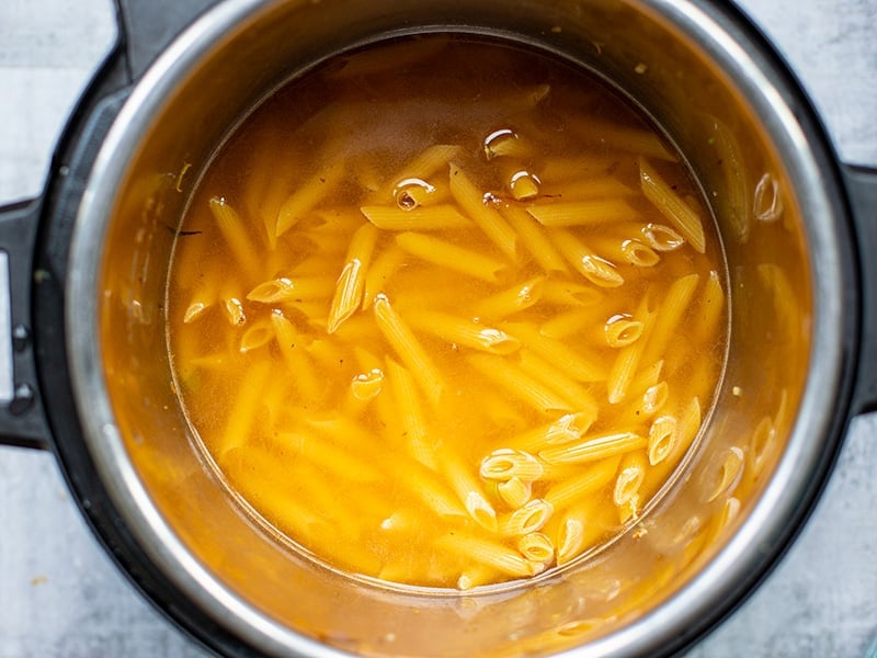 Stir pasta in the pot