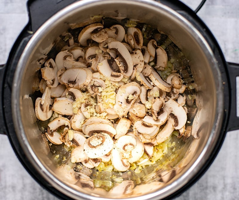 Saute onions and mushrooms in the Instant Pot