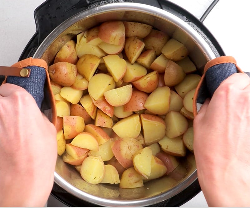 Straining potatoes after cooking