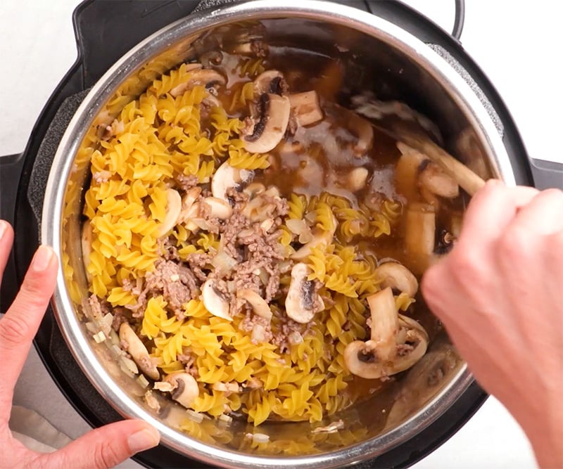 Stir past and ground beef in Instant Pot