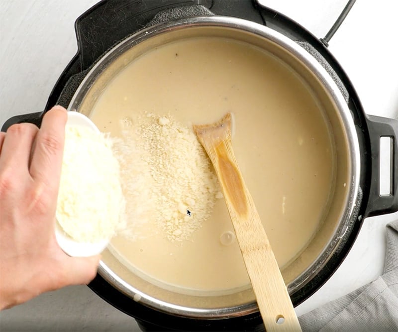 Adding Parmesan to soup