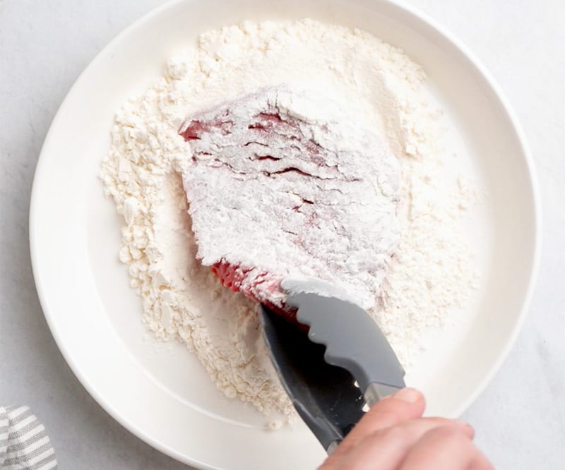 Dusting steak in flour