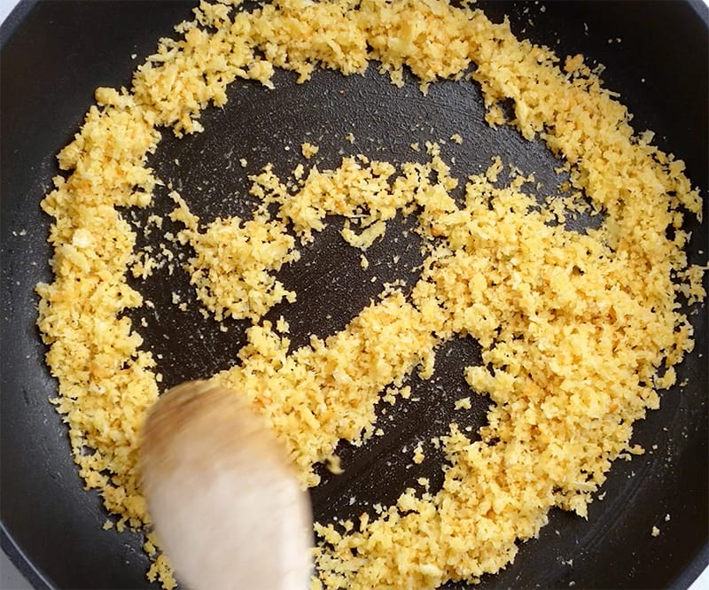 Pan frying crumbs until toasted