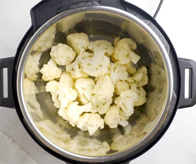 Cut up cauliflower in the Instant Pot