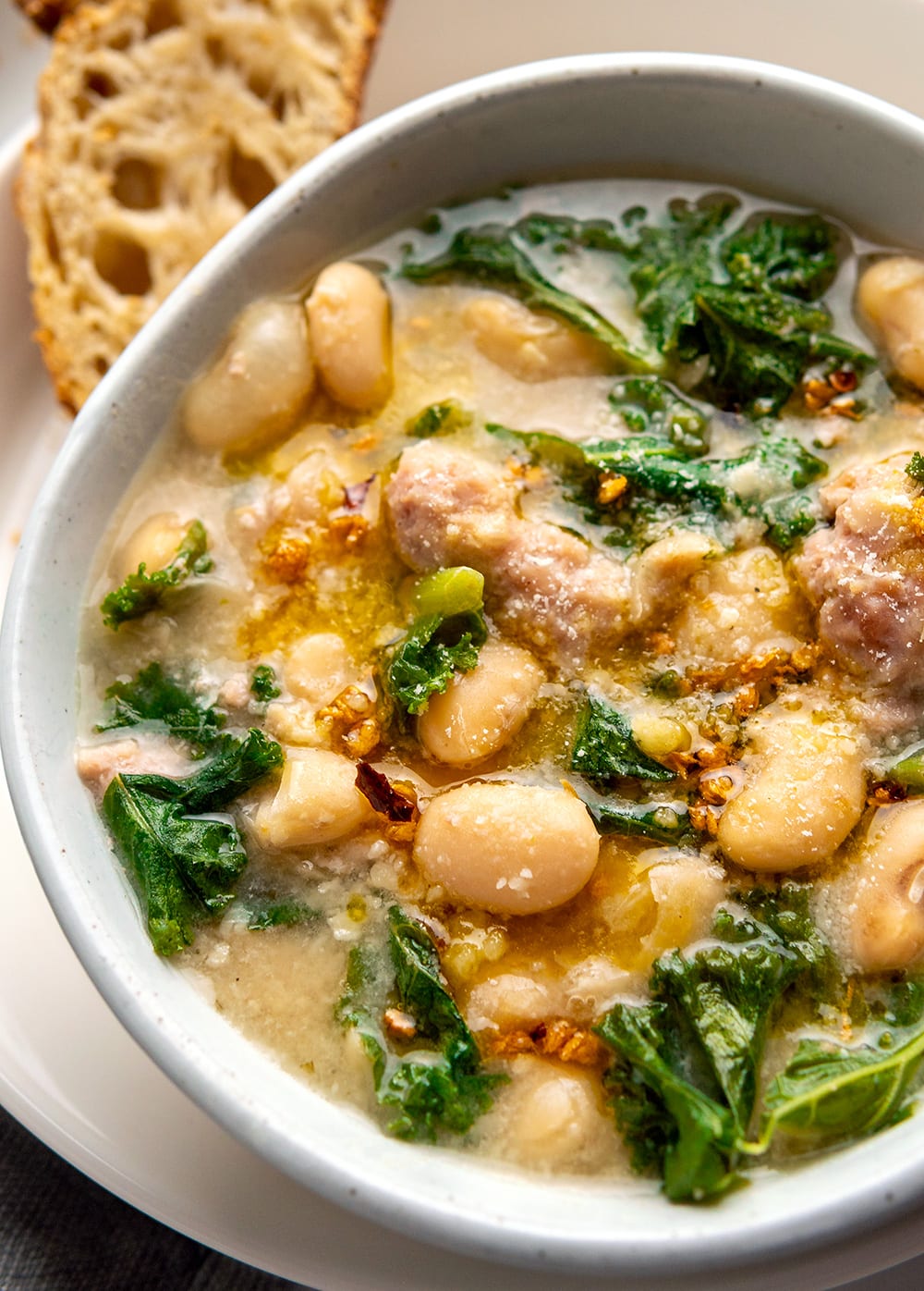 Instant Pot Bean Stew With Sausage, Kale & Chili Garlic Oil