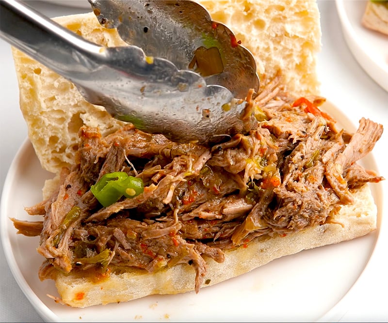 Serve the sliced/shredded beef on hoagie rolls, spoon some of the cooking jus over the beef and serve extra on the side.