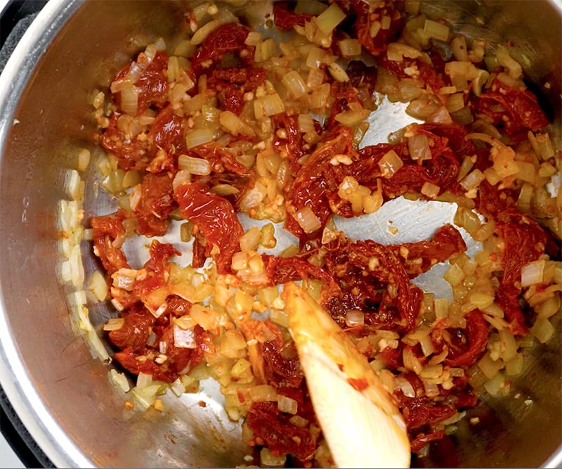 Sauteed onions, garlic and sun dried tomatoes in the Instant Pot