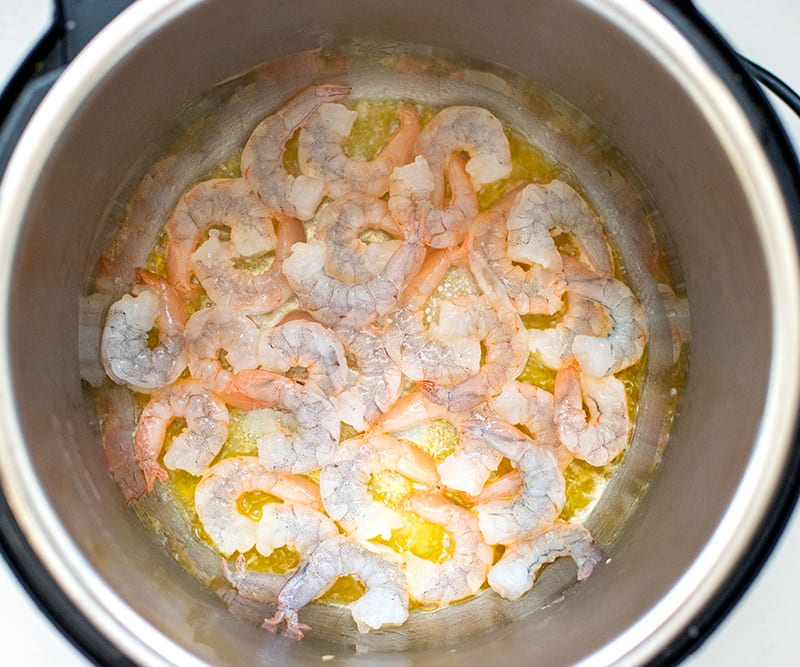 Saute the shrimp in butter for 2 minutes, stirring once for Spaghetti With Shrimp Scampi.