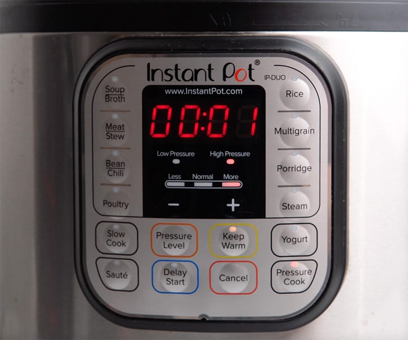 Lock the Lid and Set Cooking Time: Securely lock the Instant Pot lid in place. Set the pressure release valve to the sealing position. Select the "Manual" or "Pressure Cook" mode and set the cooking time to 1 minute.