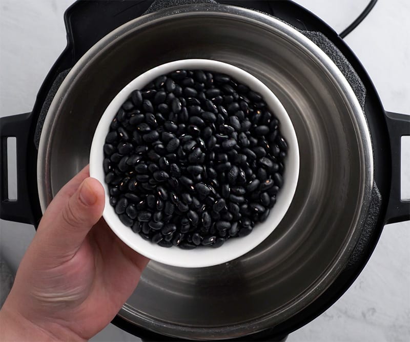 Add black beans to pot