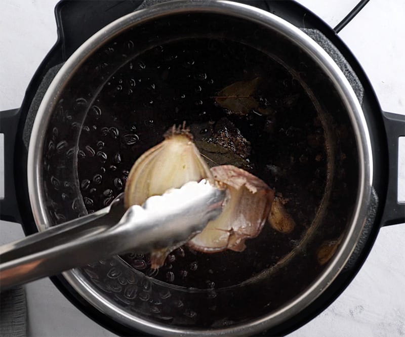 Remove onions, garlic, bay leaf