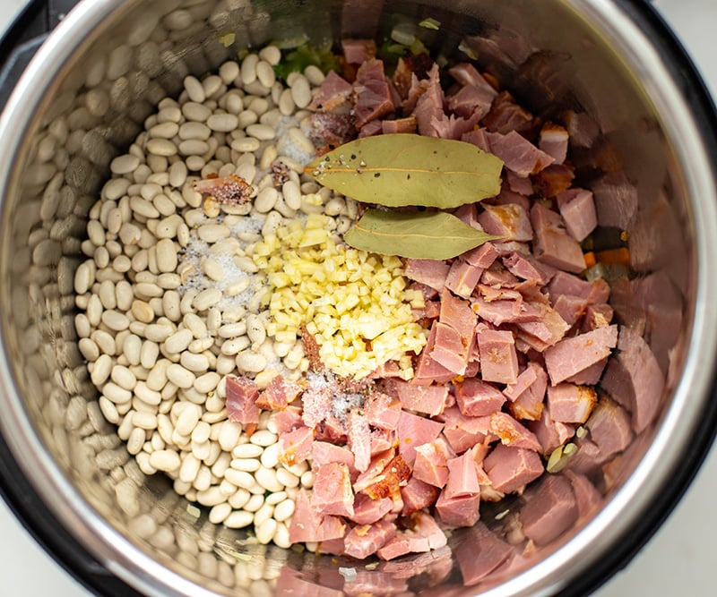 add hams beans and seasoning