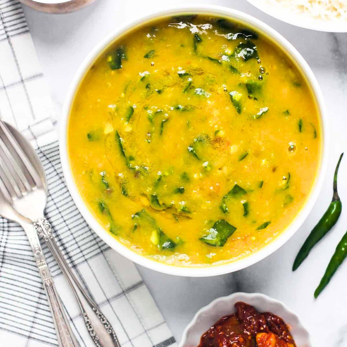 A simple and wholesome Easy Instant Pot Spinach Dal with yellow lentils, spinach, and spices, served with fluffy rice for a satisfying meal.







