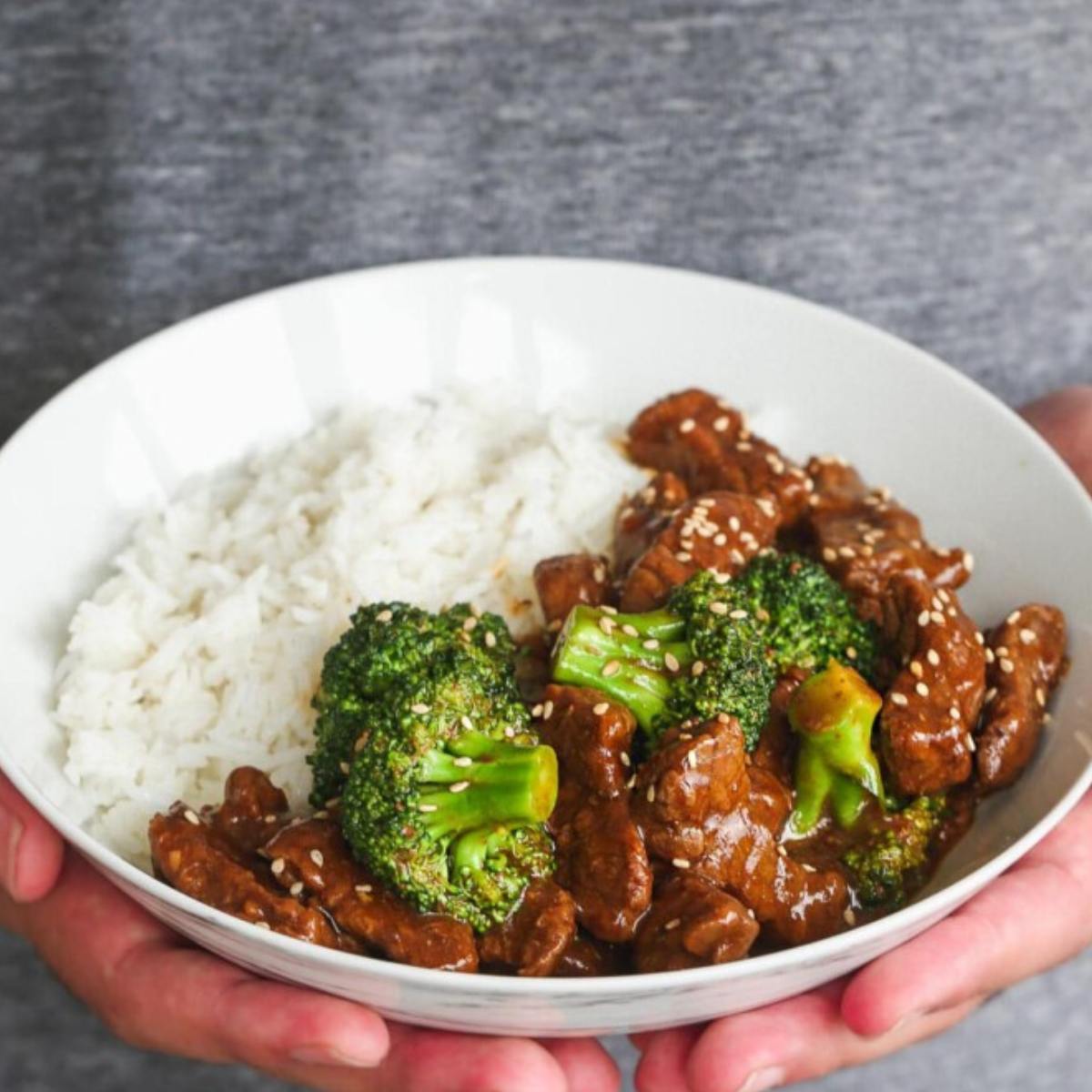 A savory Instant Pot Beef & Broccoli with tender beef slices in a rich, garlicky soy-ginger sauce, served over steamed rice or cauliflower rice.







