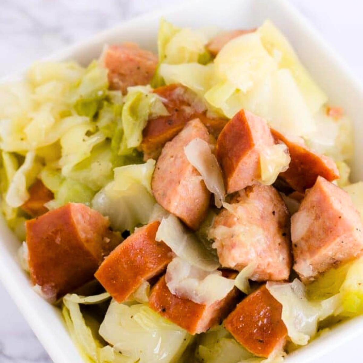 
Hearty Kielbasa and Cabbage cooked in the Instant Pot, featuring tender kielbasa slices and sautéed cabbage in a flavorful broth.