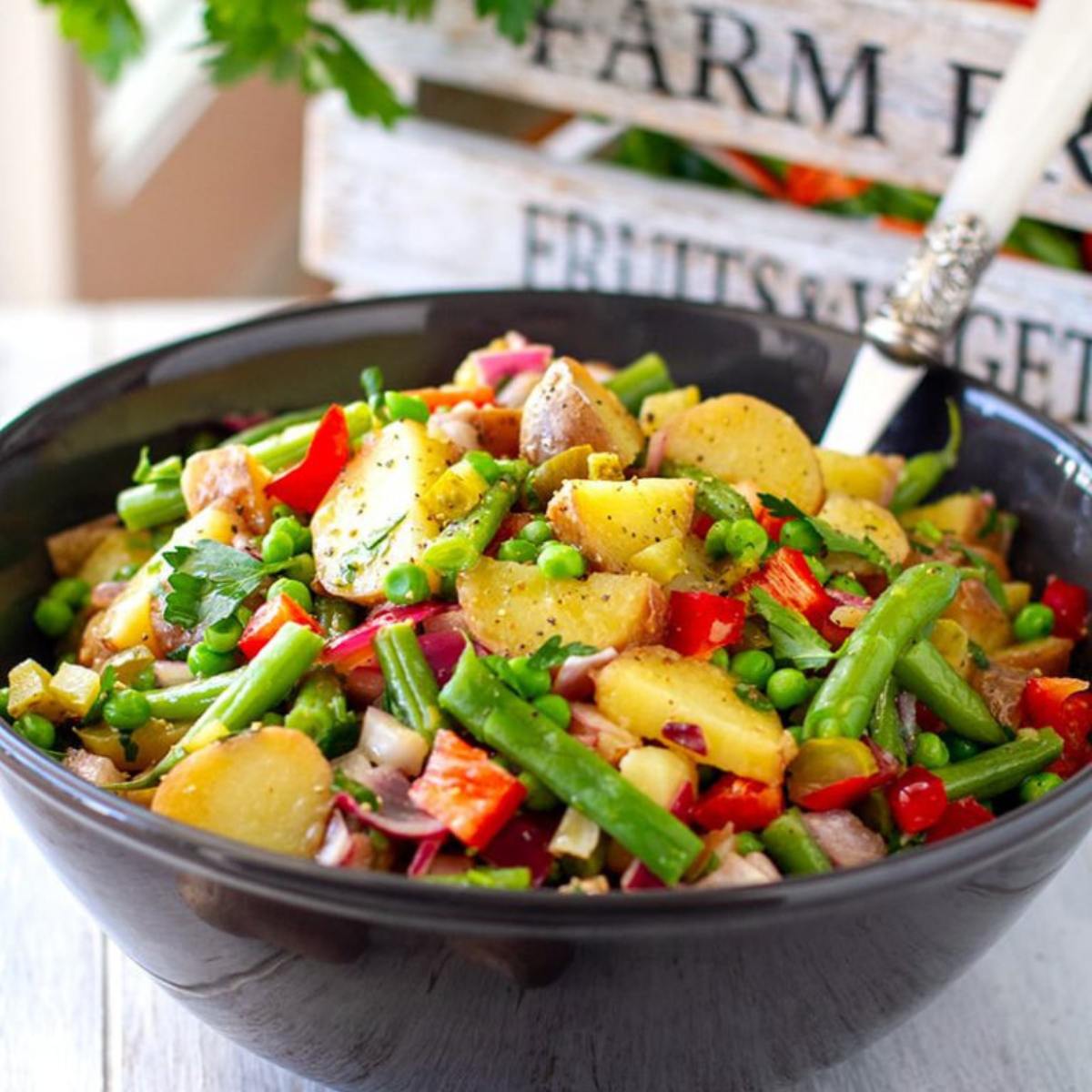 A refreshing Potato Salad with tender potatoes, crisp vegetables, and a tangy vinaigrette dressing, perfect for a light and flavorful side dish.







