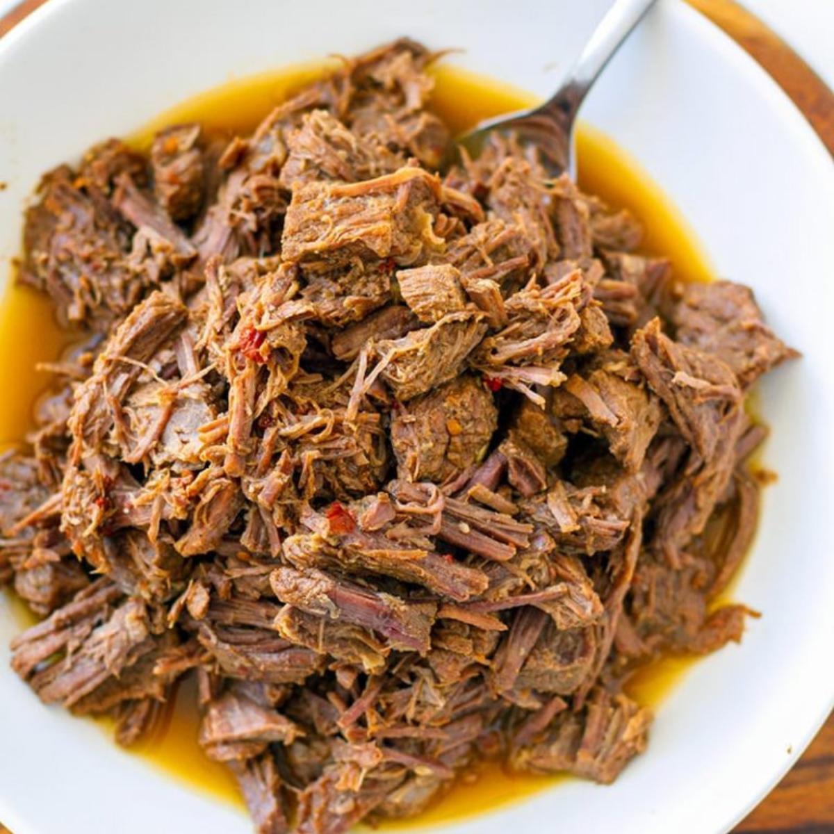 Tender Shredded Beef cooked to perfection, seasoned with herbs and spices, and perfect for Paleo, Whole30, and gluten-free diets. Ideal for tacos, bowls, or salads.







