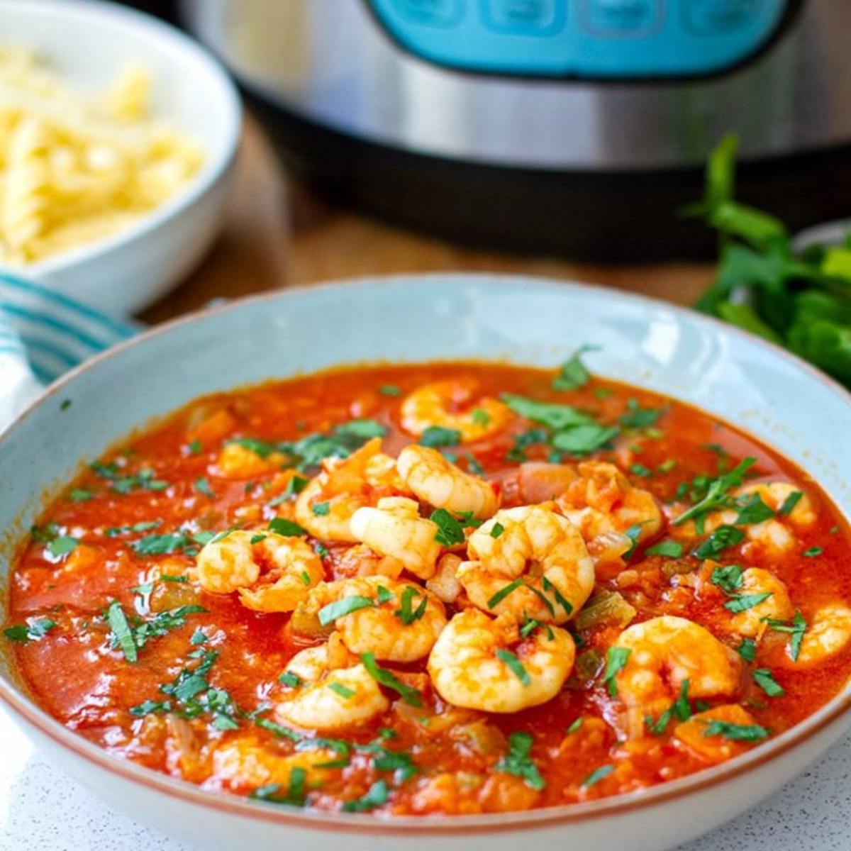 A quick and flavorful Shrimp with Tomato & Garlic made with frozen shrimp, sautéed in a garlic-infused tomato sauce, and garnished with fresh herbs.







