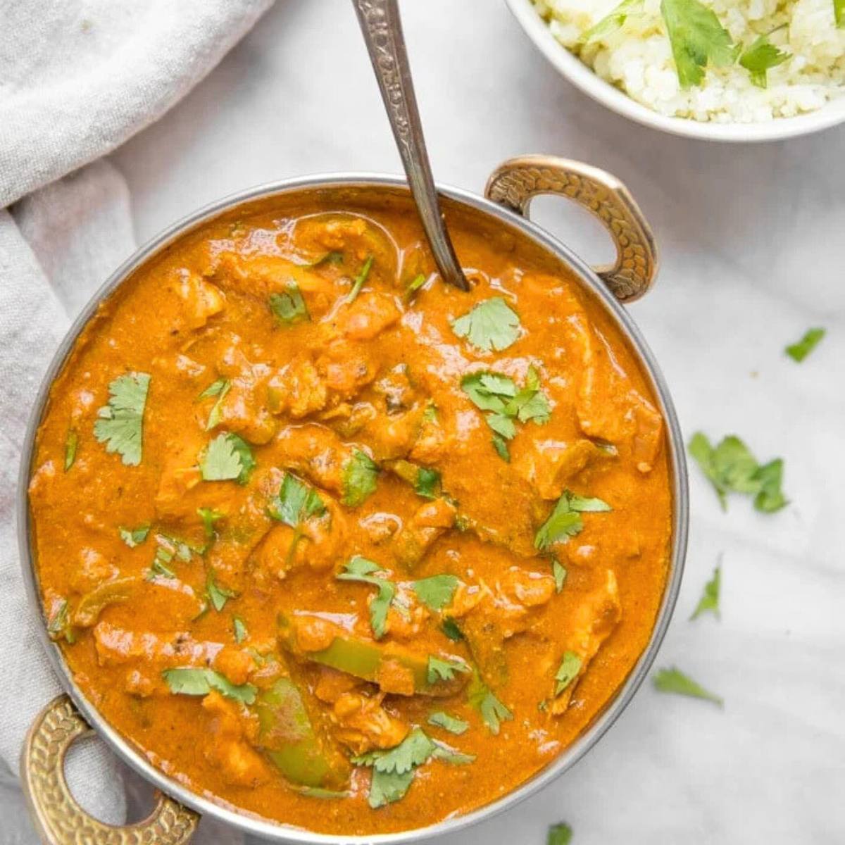 Flavorful Whole30 Instant Pot Chicken Tikka Masala, made with tender chicken in a creamy, spiced coconut milk sauce, paleo and low-carb.