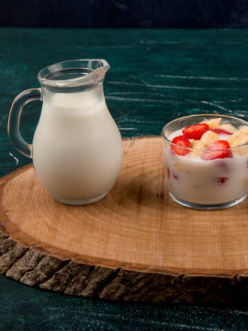 strawberries in yogurt served with milk