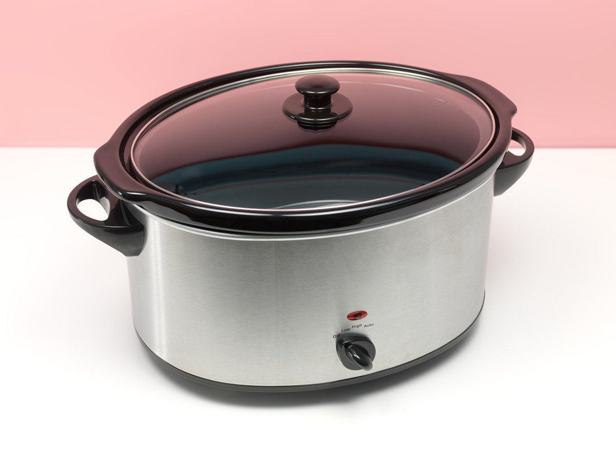 an electric slow cooker on a kitchen counter