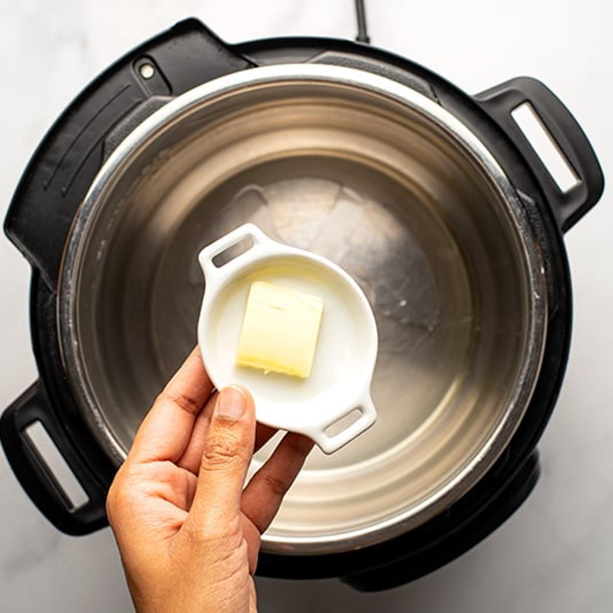 butter is put in the instant pot