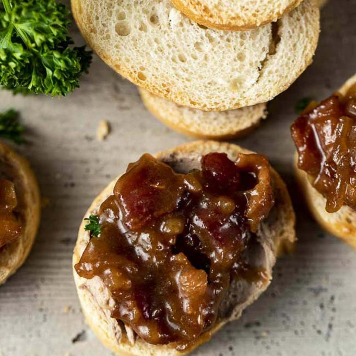  A slice of baguette bread topped with a generous spoonful of bacon onion jam. cold appetizer recipes