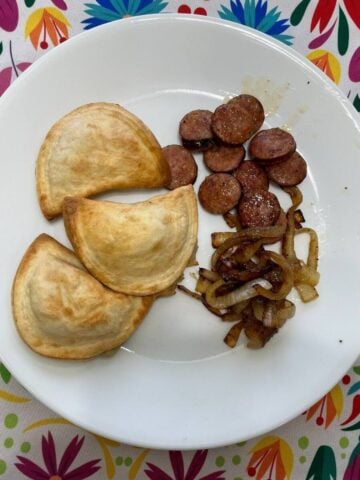 pierogies with fried onions and sausages