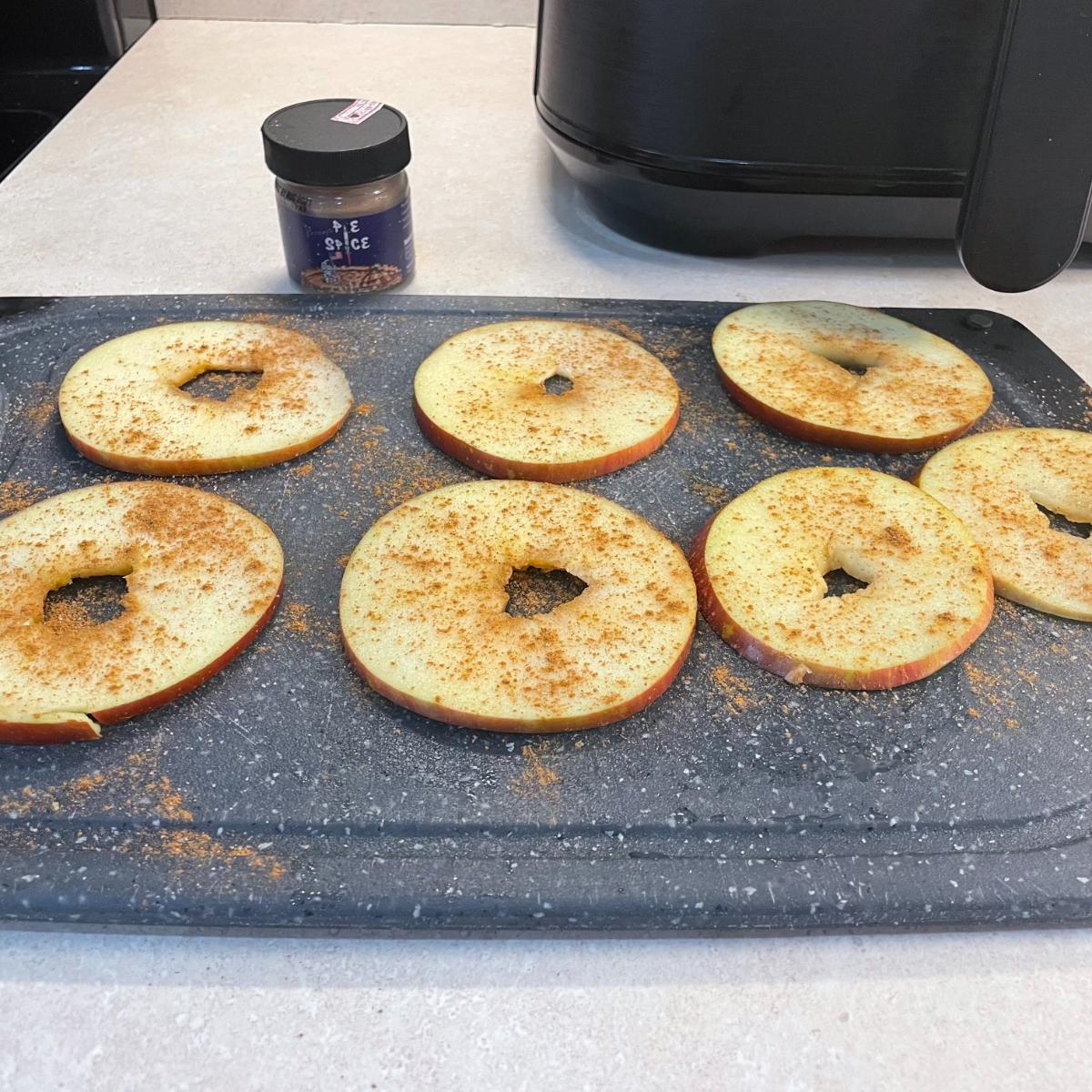 sliced apples, sprinkled with cinnamon