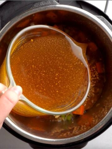 adding broth to instant pot
