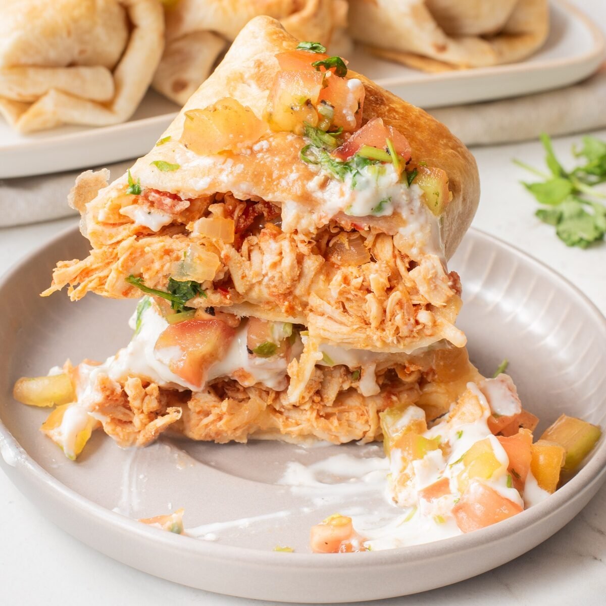 air fryer chimichingas on a white plate