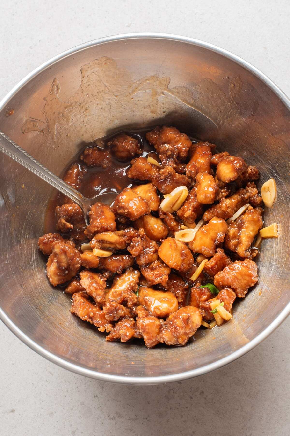 exclusive air fryer spicy orange chicken in a bowl