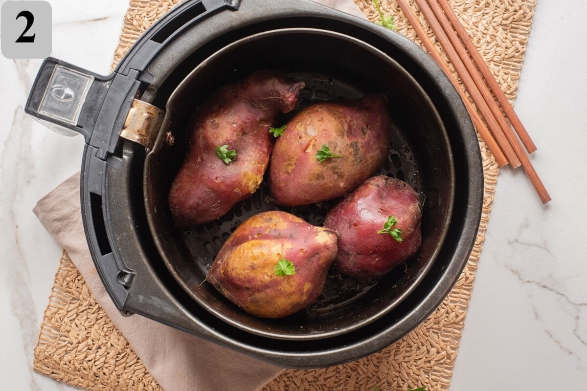 Preheat to 375ยฐF (190ยฐC), air fry sweet potatoes spaced apart for 35โ45 minutes (up to 55 for large), flipping halfway, until crisp and fork-tender.
