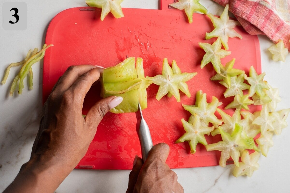 lay the fruit sideways and slice straight across